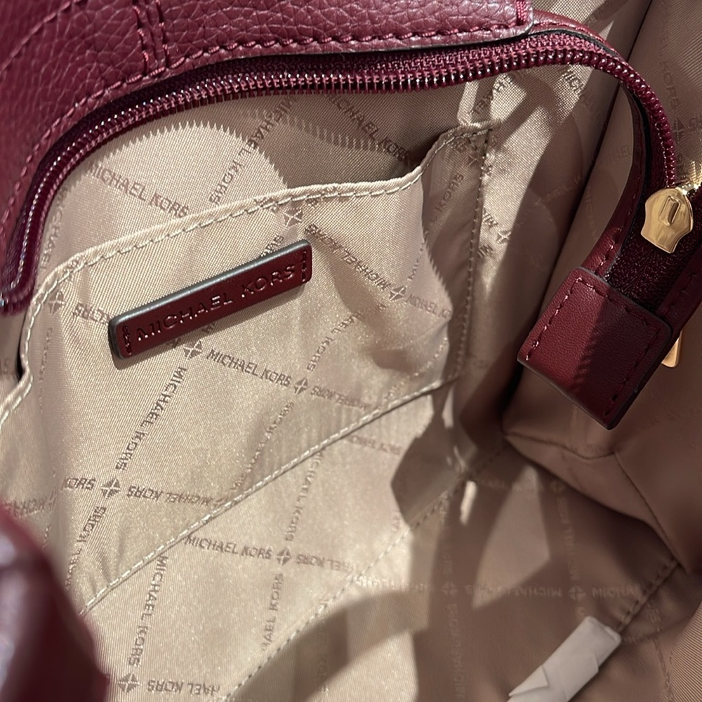 Michael Kors Mirella Small Pebbled Leather Crossbody Bag
Oxblood 
NWT - Picture 11 of 16